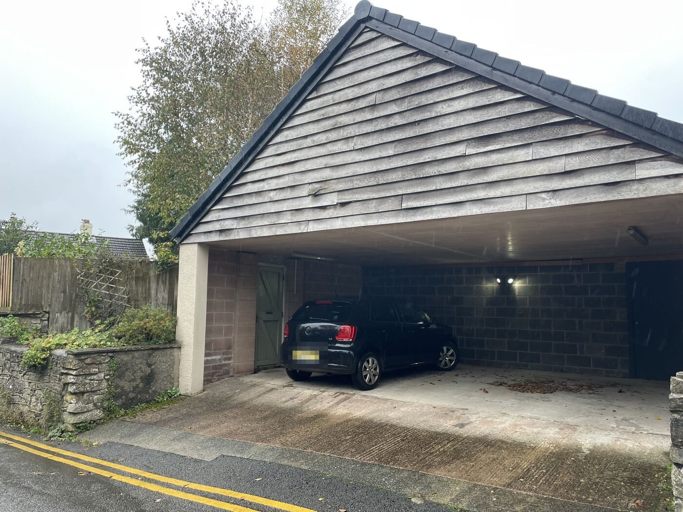 Covered carport with space for two cars
