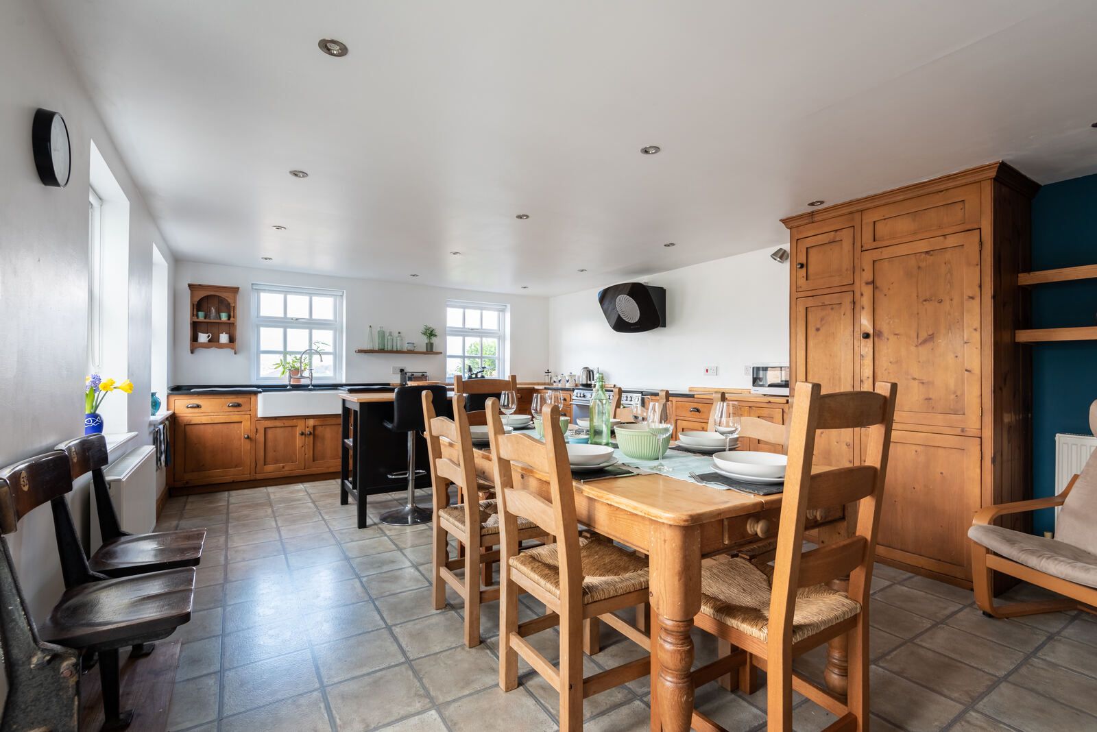 Large kitchen with pine dining table and oak dresser